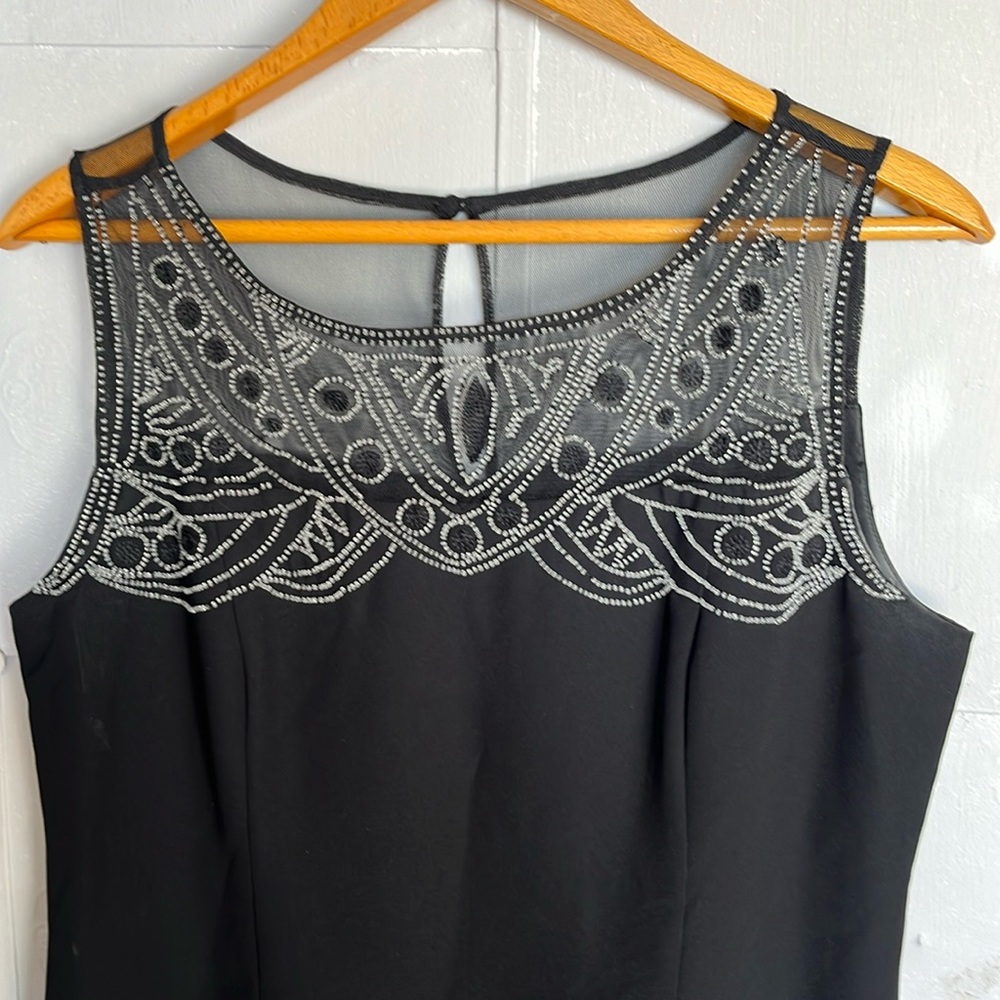 Black sleeveless evening dress perfect for black tie wedding.